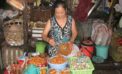 An open air market in Vietnam Dampening Asian demand cools crude oil prices