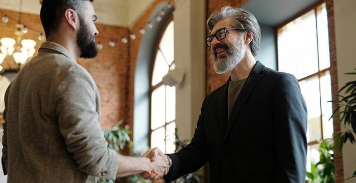 handshake meeting business What you need to know if you’re selling your business